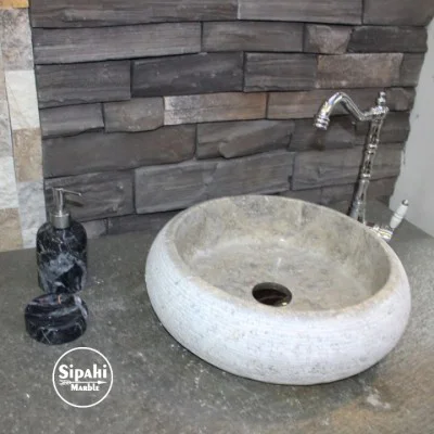 Gümüş Traverten Özel Dizayn Bombeli Lavabo Gümüş Traverten Özel Dizayn Bombeli Lavabo
